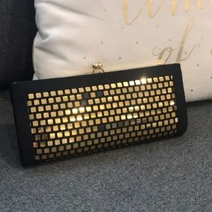 Jessica McClintock Black gold clutch